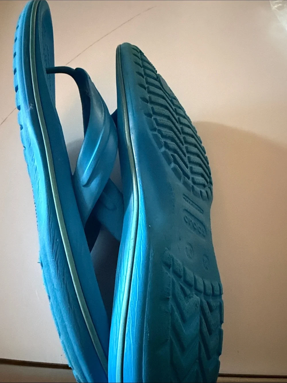 CROCS blue flip flops.  Men’s size 10. Fair condition.